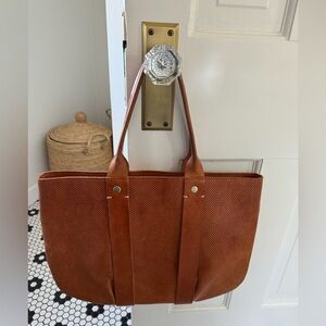 Clare V  La Tropezienne in perforated miel leather